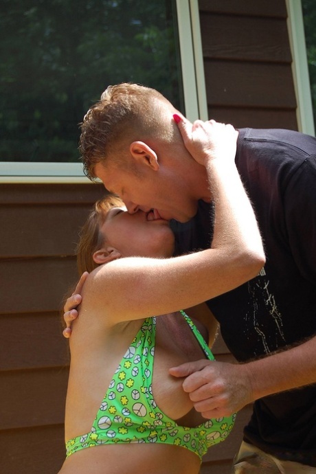 Older redhead amateur Dee Delmar bangs one guy then another behind her house