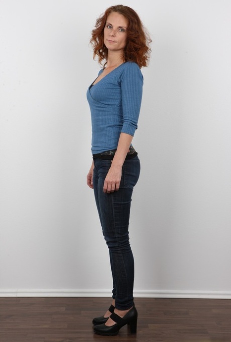 Redhead amateur Pavla poses in blue jeans before taking off all her clothes