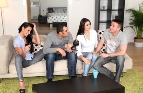 Dark haired Euro girls with big tits have a foursome with two big dicks