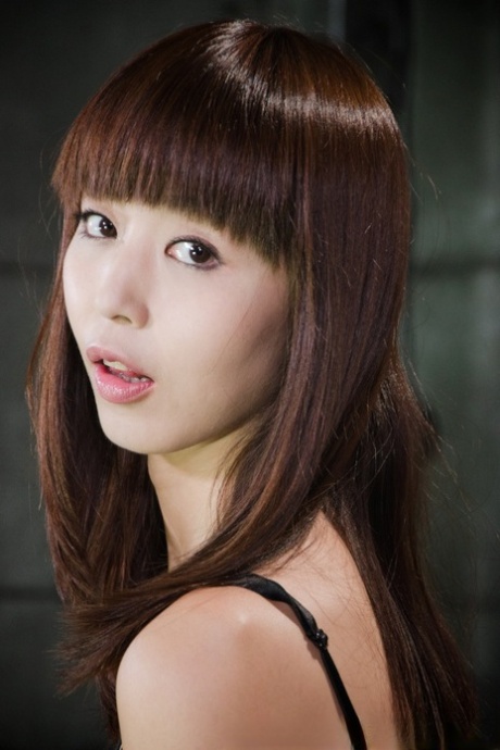 Adorable Asian teen Marica Hase endures forced masturbation in dungeon