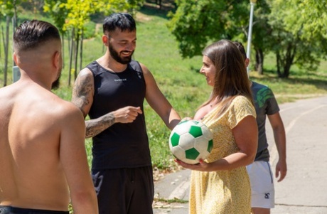 Busty soccer mom does a double penetration during a gangbang