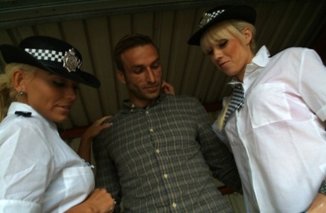 British policewoman Syren Sexton and Caprice Jane deliver a CFNM blowjob