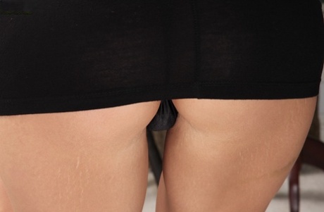 Slim babe Amy Johnson is showing her astounding asshole in black panties