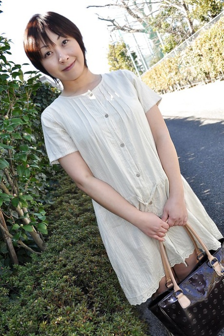 Chubby asian MILF Masae Shimatani undressing and playing with herself