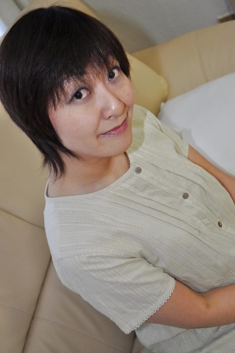 Chubby asian MILF Masae Shimatani undressing and playing with herself