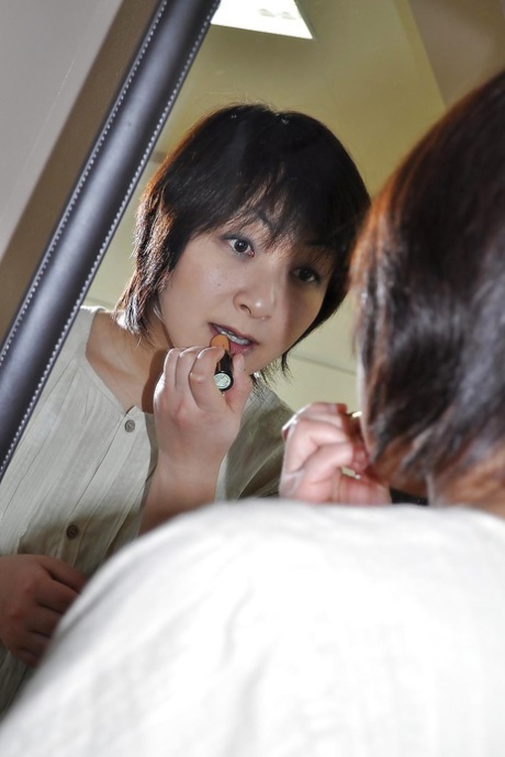 Chubby asian MILF Masae Shimatani undressing and playing with herself