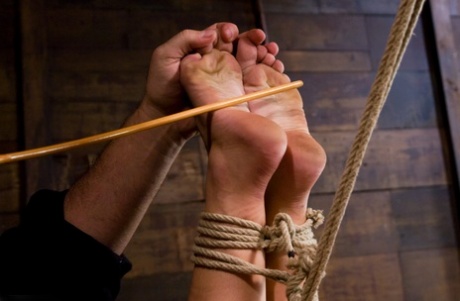 Naked MILF Kirra Lynne gets fucked with a dildo in rope bondage