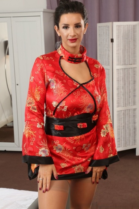 Fantastic MILF Cara Ruby removes her geisha outfit and reveals huge tits