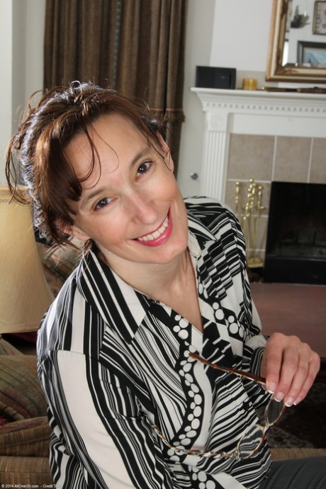 Hot MILF Celeste Carpenter strips down to her stockings & shows her tasty twat