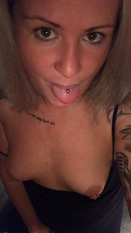 Amateur Kinky Hotwife strips and shows her tiny tits with pierced nipples