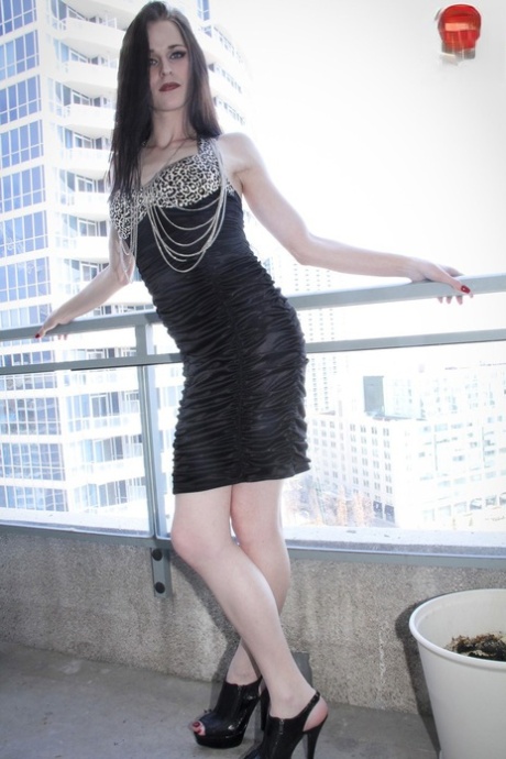 Canadian shemale beauty Anastasia unveils and massages her huge dick