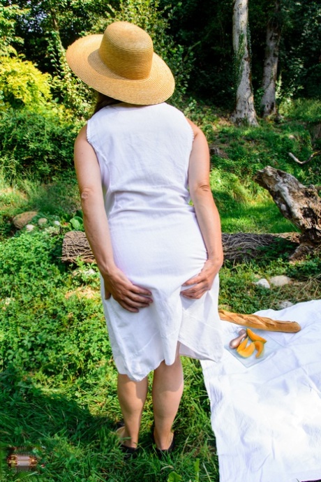 German granny Busty Tina shows her big tits & masturbates to orgasm in nature