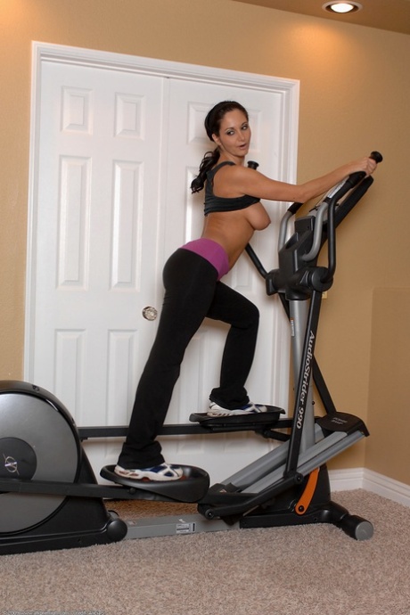 Amateur MILF Ava Addams strips during her workout & shows her big tits & ass