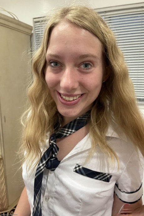 Blonde schoolgirl Kallie Taylor shows off her hairy pussy & her big booty